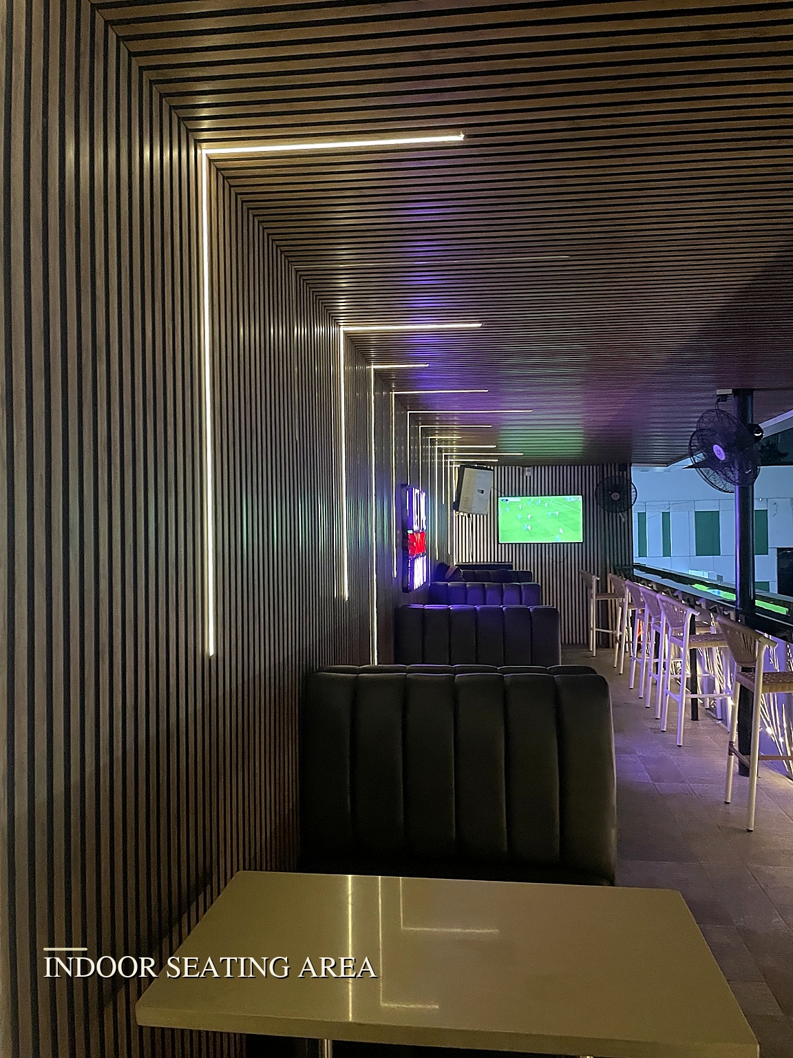 The Loft Indoor Booths with Slat Lighting